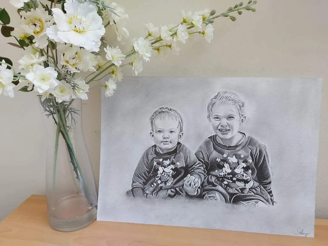 Pencil portrait commission of two children